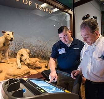 Raul Vasquez with Samsung and Don Falduto with RPS Imaging review X-rays of the lions of Tsavo at the Field Museum